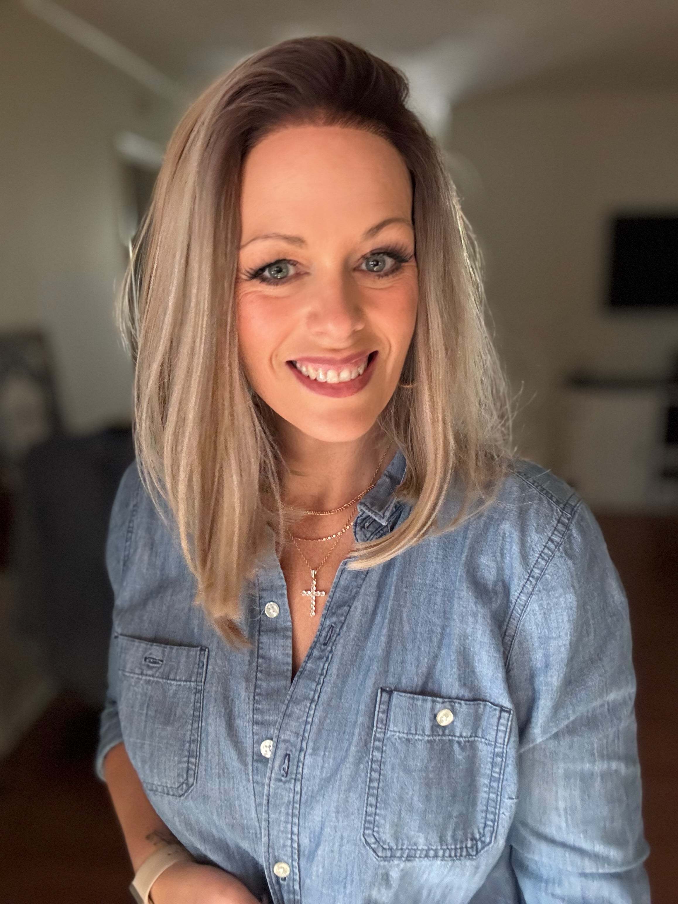 Edie rooted blonde